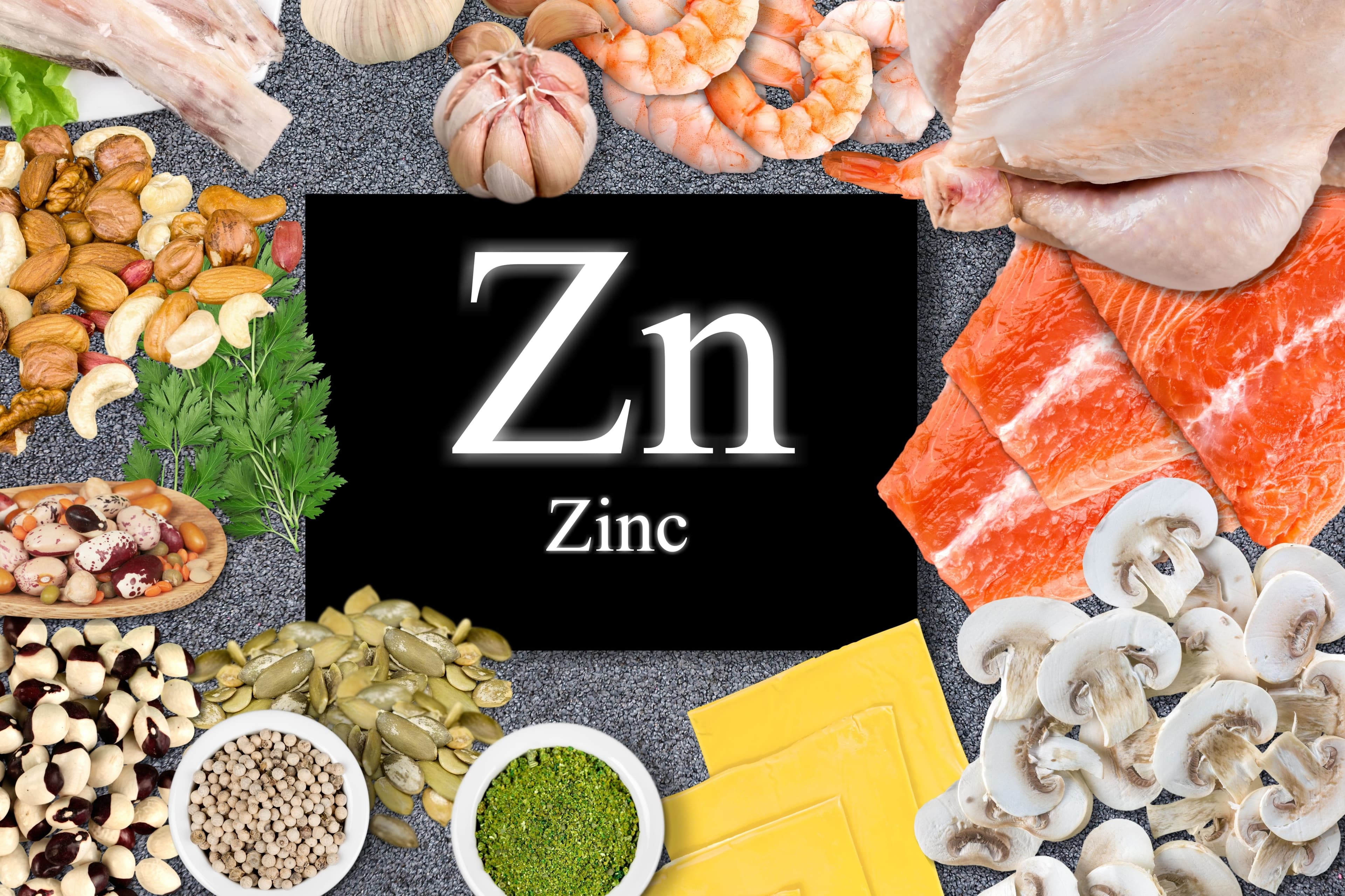 Foods high in zinc, including salmon, shrimp, beef, yellow cheese, mushrooms, and nuts, providing essential nutrients for immunity and energy.